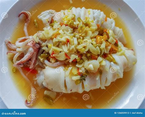  ¿Te atreverías a probar el delicioso y picante sabor del  Mariscos de Rizhao al vapor con salsa picante?